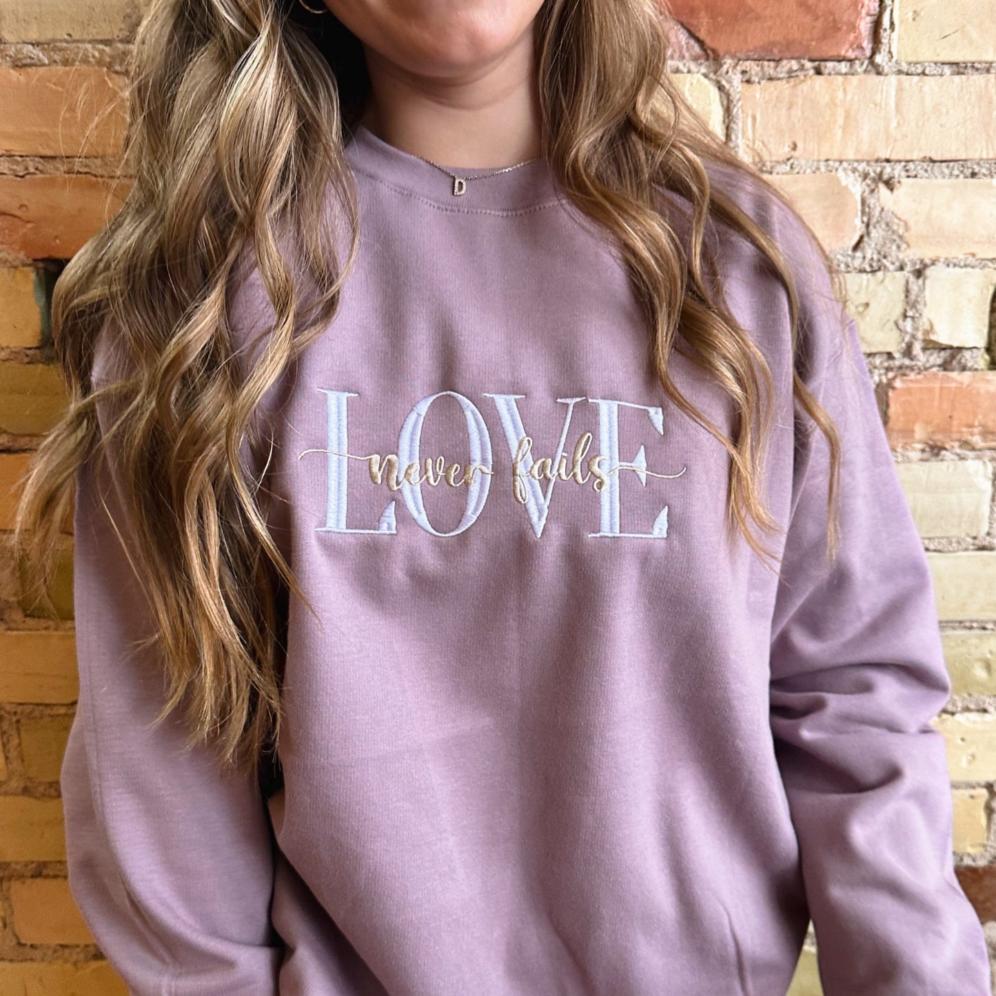 Love Never Fails Crewneck