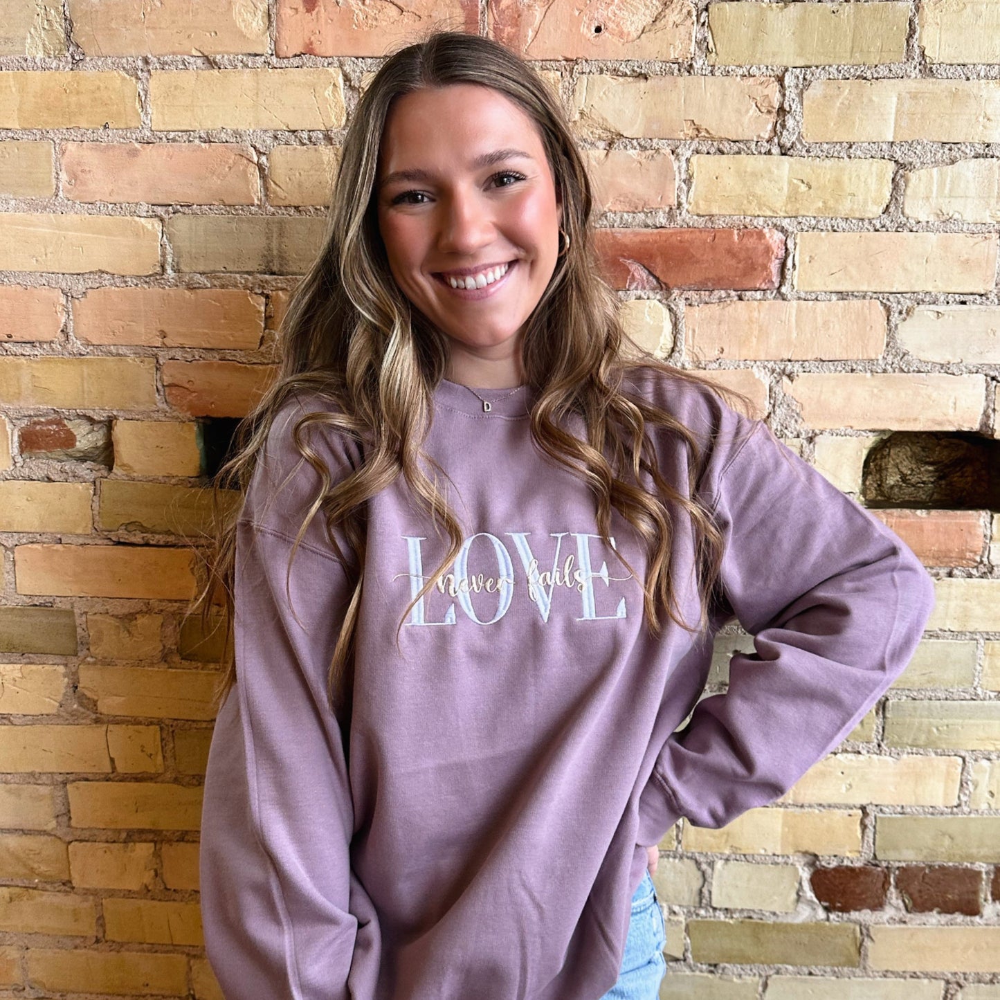 Love Never Fails Crewneck